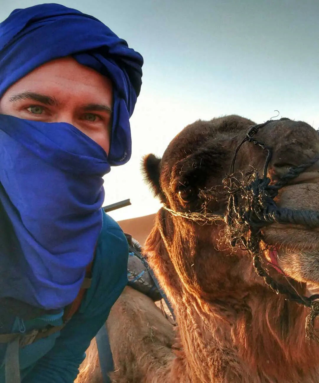 Bret McGowen taking a selfie with a camel