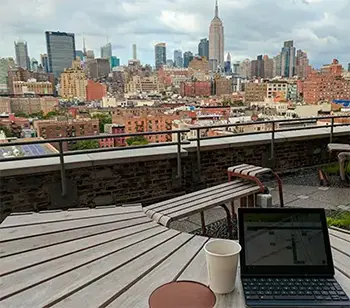 Bret McGowen's workspace overlooking New York City.